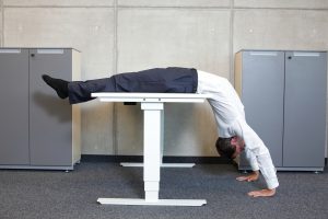Practicing yoga to relieve stress at work